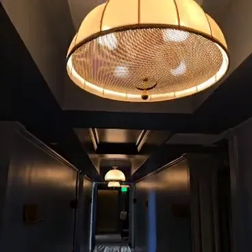 Pendant lighting installed in a commercial hallway