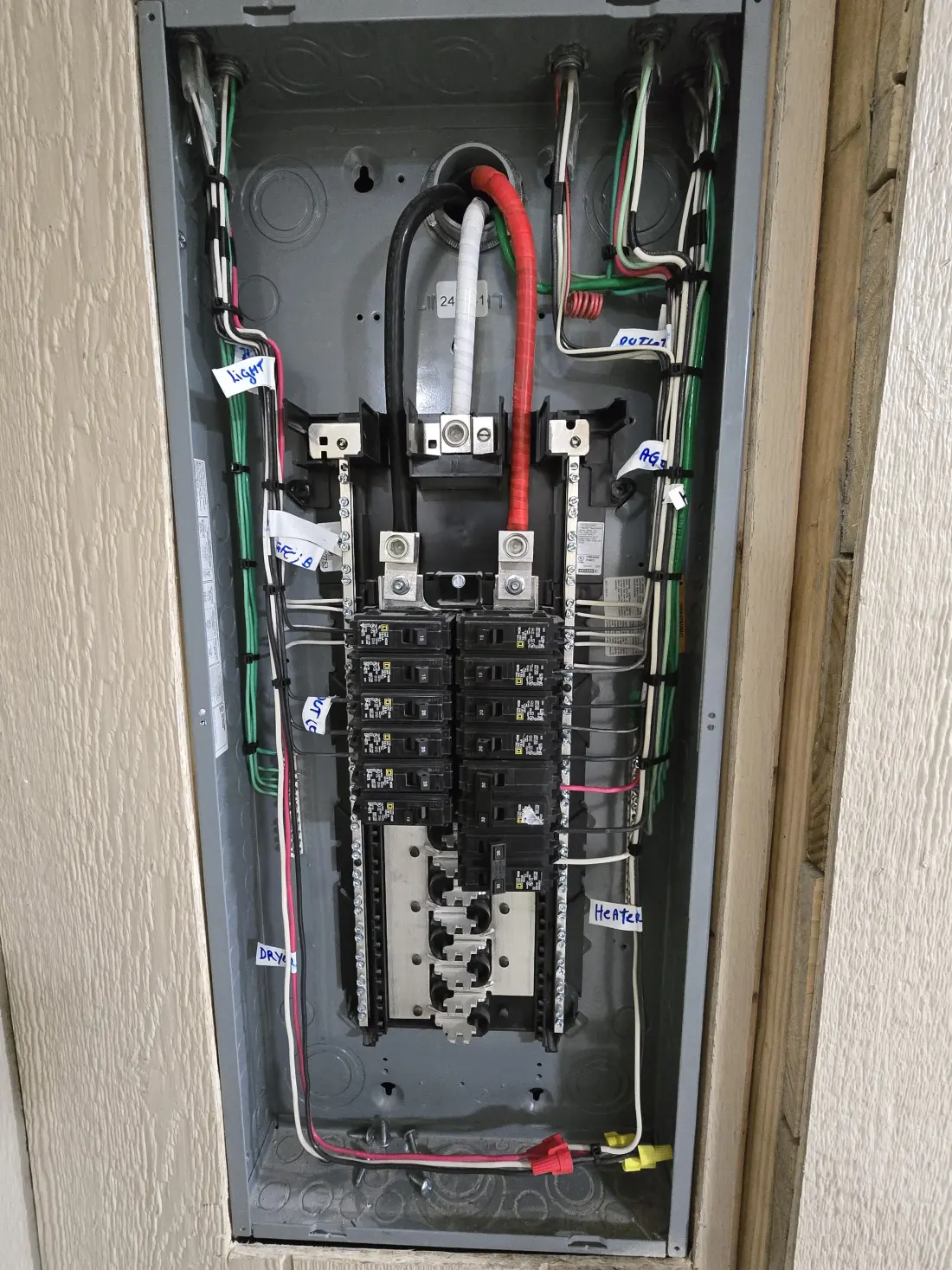 Residential electrical panel with neatly routed and labeled circuits, installed in Orlando, FL